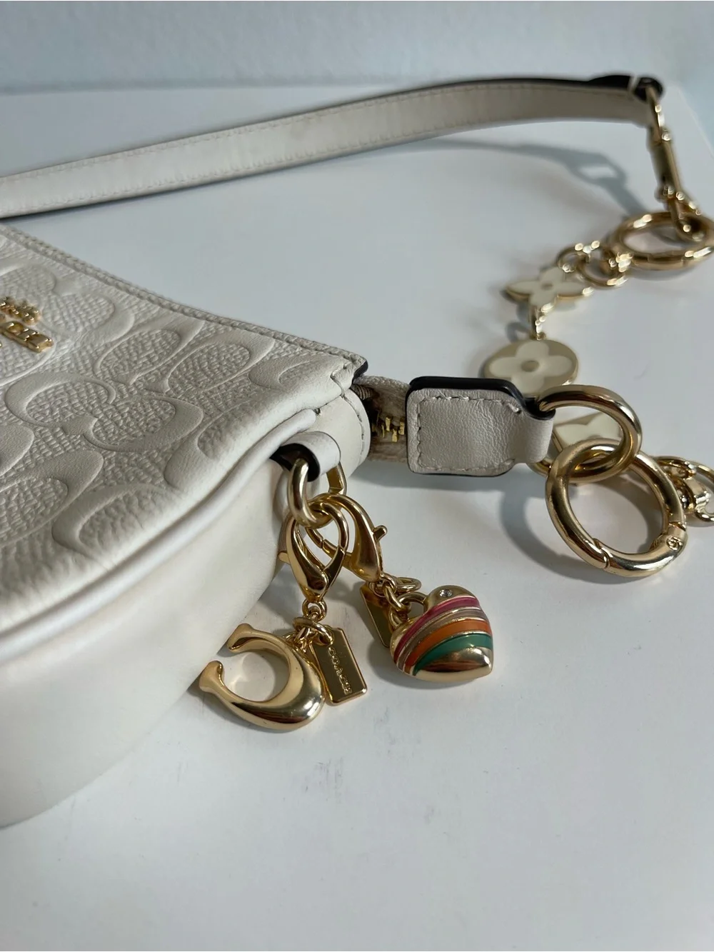 Coach Cream Signature Embossed Leather Mini Wristlet with Gold Accents